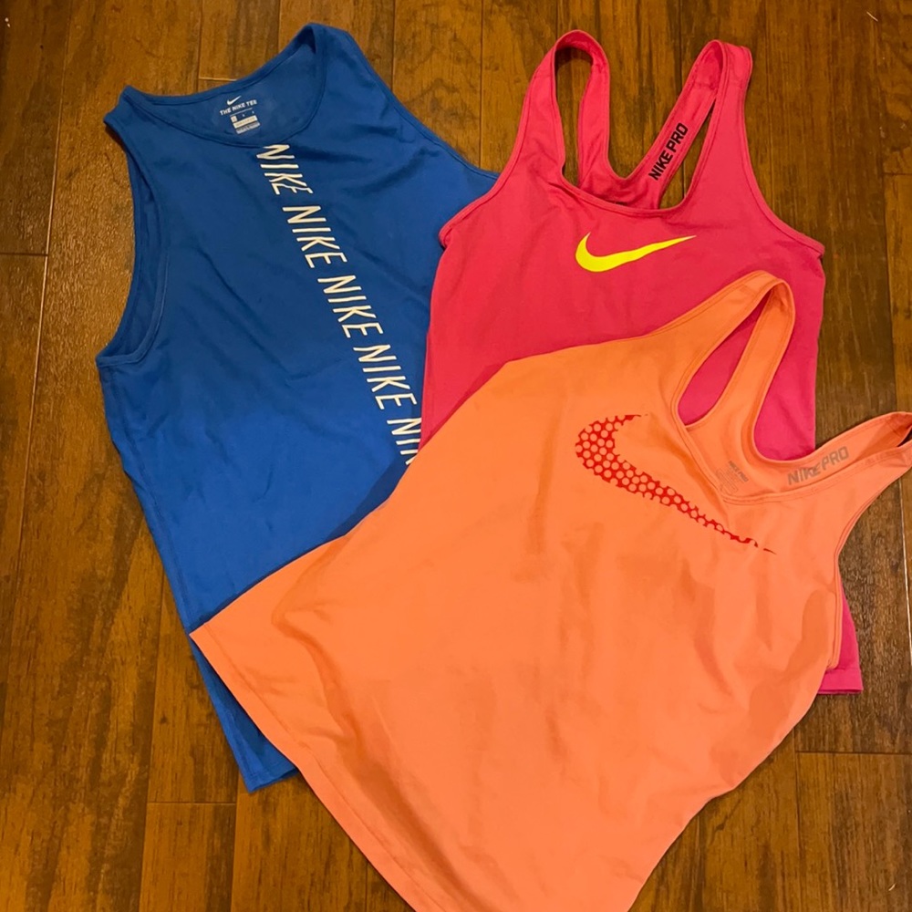 3 Nike tank tops
